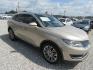 2017 Gold /Tan Lincoln MKX Reserve (2LMPJ6LR8HB) with an 3.7L V6 DOHC 24V engine, Automatic transmission, located at 15016 S Hwy 231, Midland City, AL, 36350, (334) 983-3001, 31.306210, -85.495277 - Photo#0